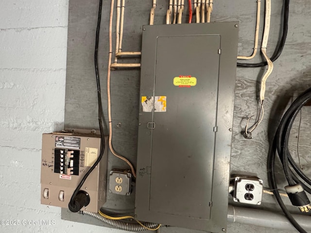 utility room featuring electric panel