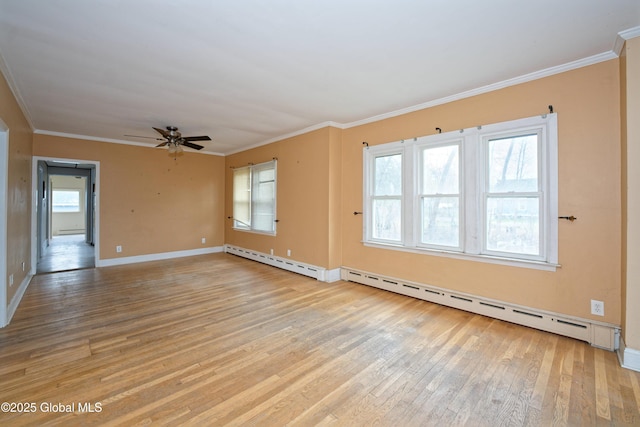 unfurnished room with light wood-style floors, a ceiling fan, ornamental molding, and baseboards