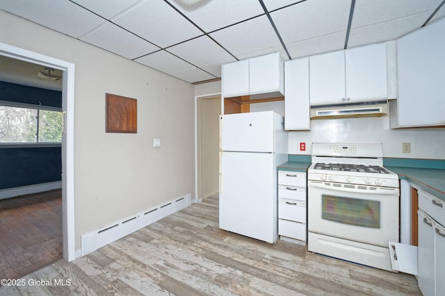kitchen featuring a paneled ceiling, under cabinet range hood, baseboard heating, white appliances, and white cabinets