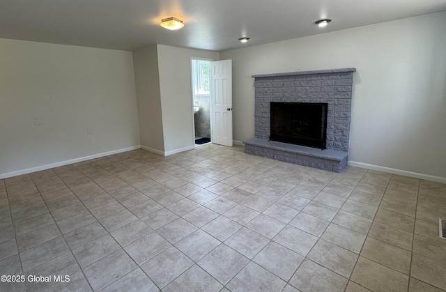 15 Campus View Dr, Colonie, NY 12211 - unfurnished living room with tile patterned flooring, a fireplace, and baseboards