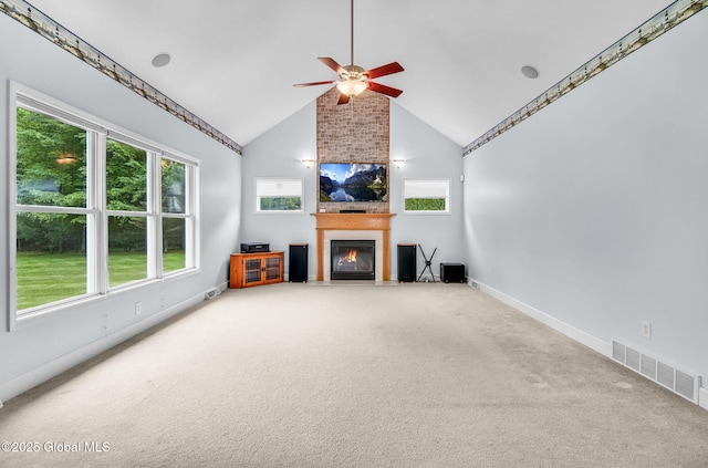 23 Jarose Pl, Clifton Park, NY 12065 - unfurnished living room featuring a fireplace, carpet, plenty of natural light, and high vaulted ceiling