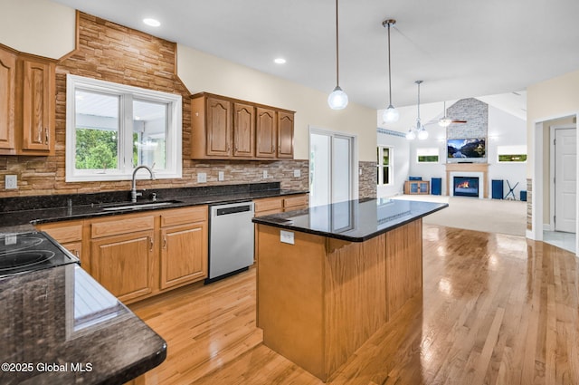 23 Jarose Pl, Clifton Park, NY 12065 - kitchen with dishwasher, a sink, a center island, light wood-style flooring, and high vaulted ceiling