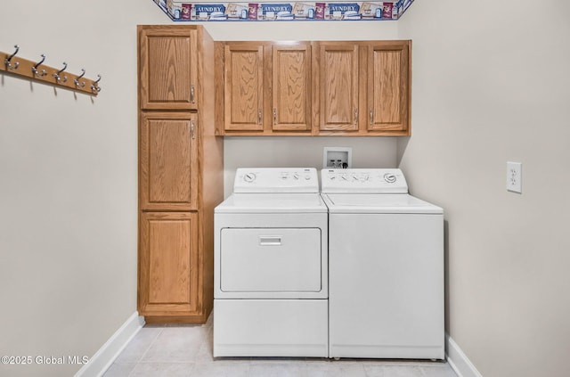 23 Jarose Pl, Clifton Park, NY 12065 - washroom with washer and dryer, cabinet space, baseboards, and light tile patterned flooring