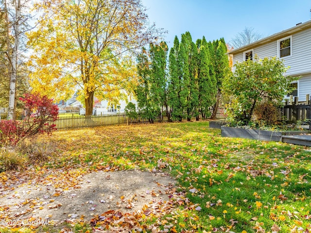 view of yard featuring fence