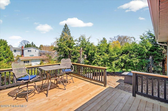 deck featuring outdoor dining space