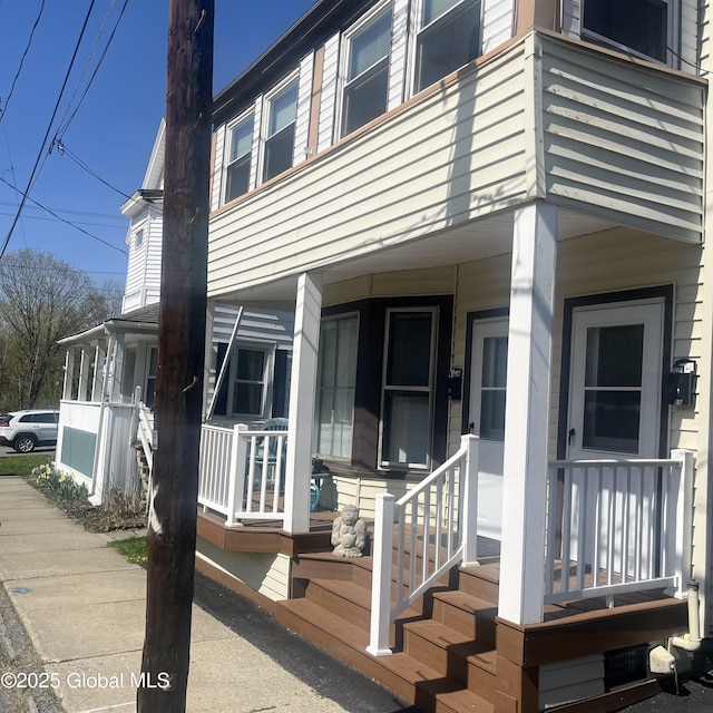 21 Depot St, Greenwich, NY 12834 - view of exterior entry featuring a porch