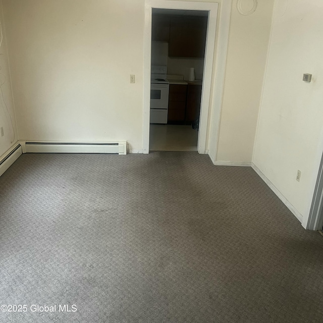 21 Depot St, Greenwich, NY 12834 - carpeted spare room with a baseboard radiator