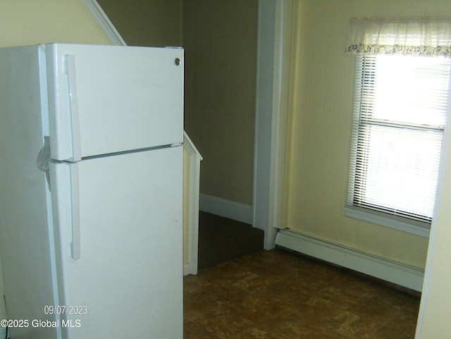 21 Depot St, Greenwich, NY 12834 - kitchen featuring freestanding refrigerator and baseboard heating