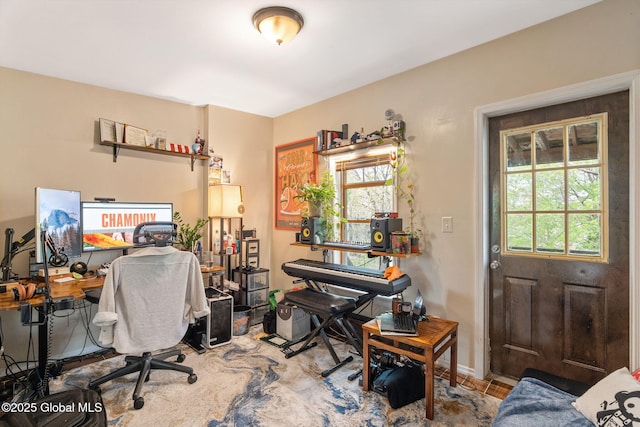office area featuring baseboards