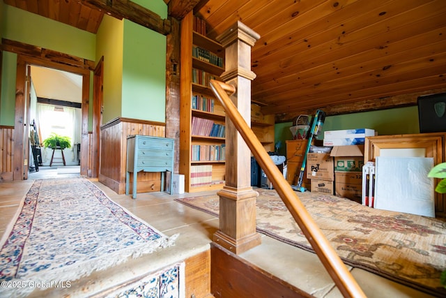 71 S Rd, Hampton, NY 12887 - bedroom featuring wainscoting, wooden walls, and wooden ceiling