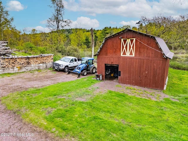 71 S Rd, Hampton, NY 12887 - view of barn featuring a lawn and a view of trees
