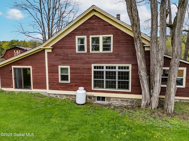 71 S Rd, Hampton, NY 12887 - rear view of house featuring a lawn and a chimney