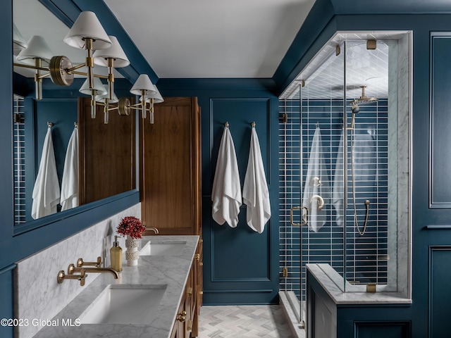 20 Oak Ridge Blvd, Saratoga Springs, NY 12866 - full bath featuring double vanity, a sink, a notable chandelier, and a shower stall