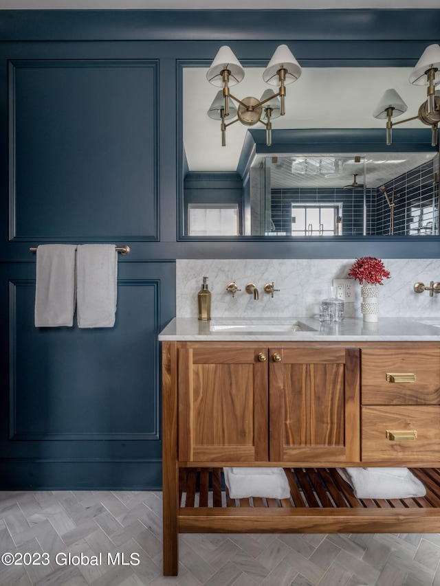20 Oak Ridge Blvd, Saratoga Springs, NY 12866 - bathroom with vanity and tasteful backsplash