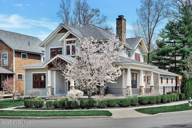 20 Oak Ridge Blvd, Saratoga Springs, NY 12866 - craftsman inspired home featuring covered porch and a chimney