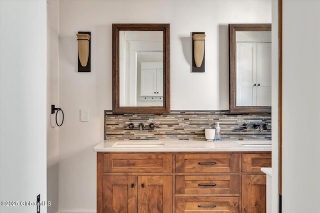 20 Oak Ridge Blvd, Saratoga Springs, NY 12866 - bathroom featuring a sink, decorative backsplash, and double vanity