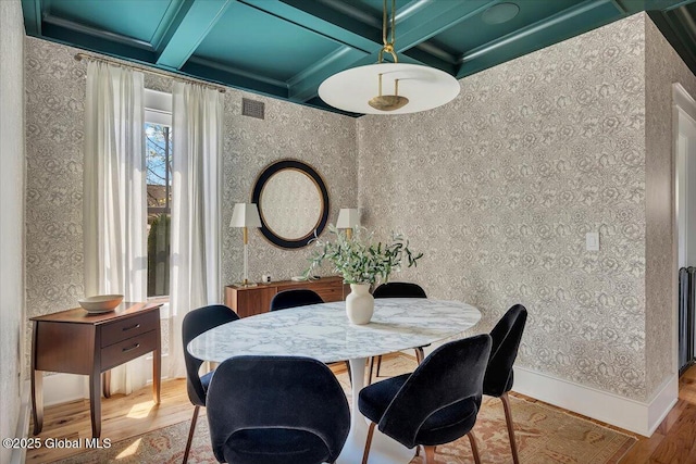 20 Oak Ridge Blvd, Saratoga Springs, NY 12866 - dining room with coffered ceiling, wallpapered walls, wood finished floors, and visible vents