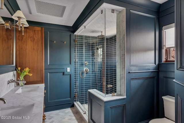 20 Oak Ridge Blvd, Saratoga Springs, NY 12866 - full bath with a sink, double vanity, toilet, visible vents, and a stall shower