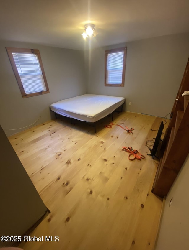 bedroom featuring hardwood / wood-style floors