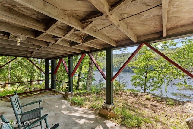 view of patio / terrace with a water view