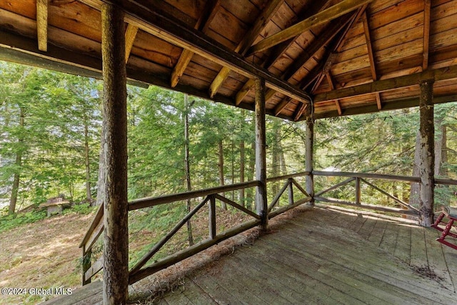 deck featuring a wooded view