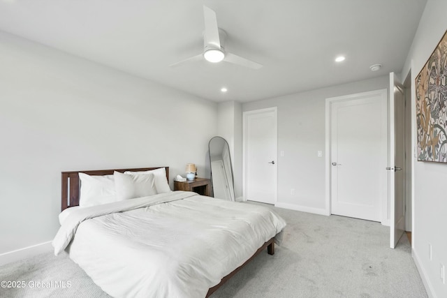bedroom with recessed lighting, baseboards, light carpet, and a ceiling fan