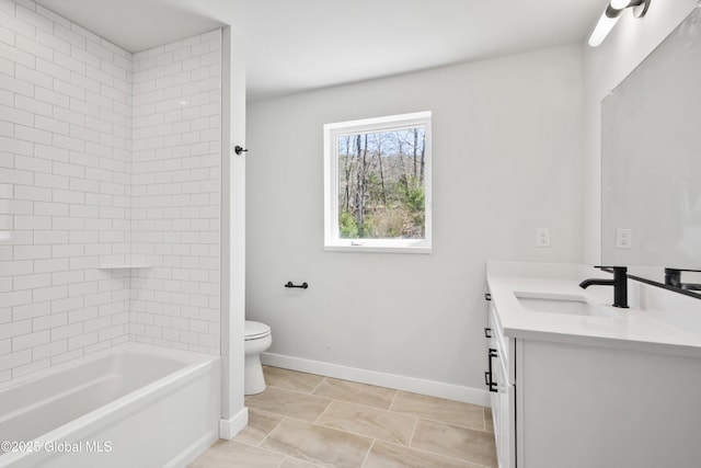 bathroom featuring shower / tub combination, tile patterned flooring, vanity, toilet, and baseboards