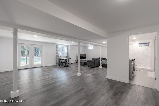23 Locust Ridge Dr, Corinth, NY 12822 - below grade area with washer and clothes dryer, dark wood-type flooring, french doors, baseboards, and recessed lighting
