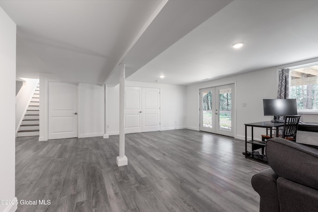 23 Locust Ridge Dr, Corinth, NY 12822 - basement with plenty of natural light, wood finished floors, french doors, baseboards, and recessed lighting