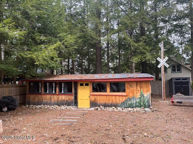 15-17 Pine Rd, Lake Luzerne, NY 12846 - exterior space featuring fence