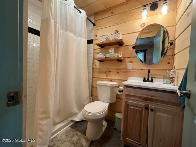 15-17 Pine Rd, Lake Luzerne, NY 12846 - full bath with vanity, wood walls, and toilet