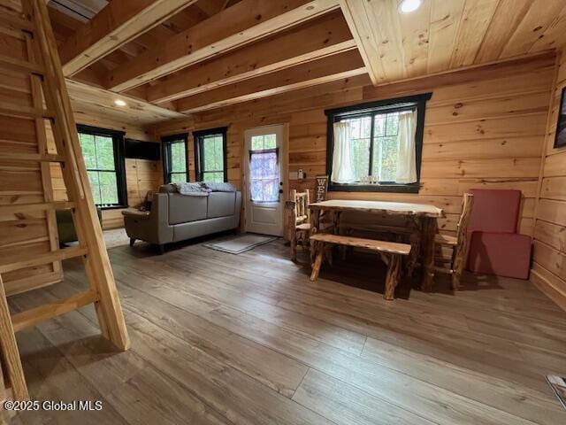 15-17 Pine Rd, Lake Luzerne, NY 12846 - interior space with wood walls, wood ceiling, a wealth of natural light, and hardwood / wood-style floors