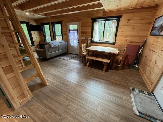 15-17 Pine Rd, Lake Luzerne, NY 12846 - interior space with wood walls and wood finished floors