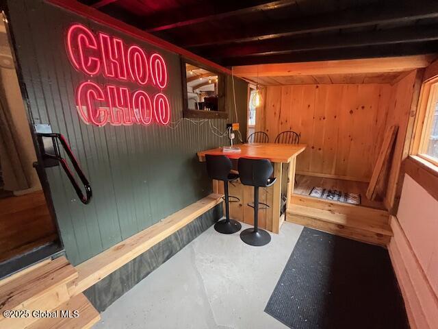 15-17 Pine Rd, Lake Luzerne, NY 12846 - bar with indoor bar, wood walls, and beam ceiling