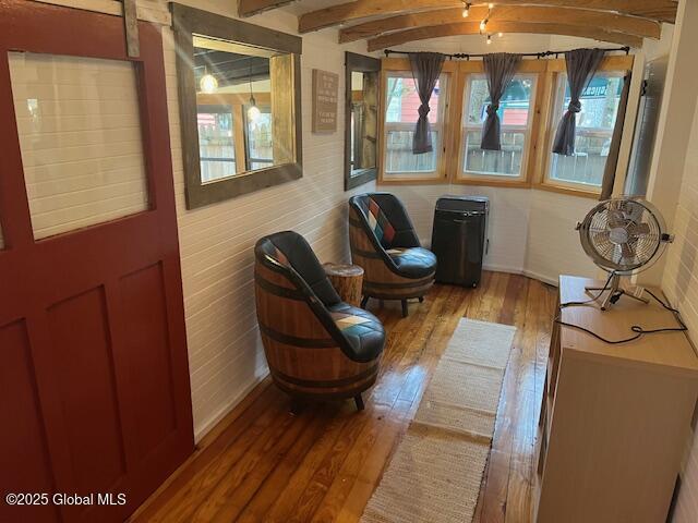15-17 Pine Rd, Lake Luzerne, NY 12846 - sitting room with beamed ceiling and wood finished floors
