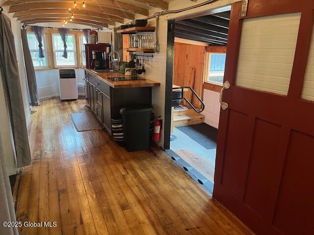 15-17 Pine Rd, Lake Luzerne, NY 12846 - interior space with open shelves, wooden counters, a healthy amount of sunlight, and hardwood / wood-style floors