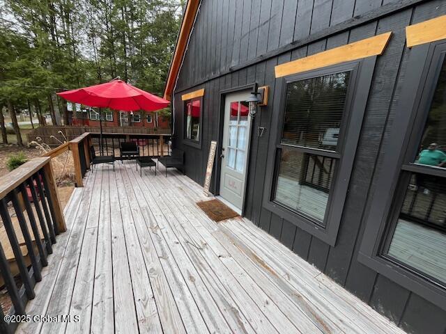 15-17 Pine Rd, Lake Luzerne, NY 12846 - view of wooden terrace