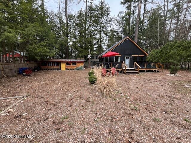 15-17 Pine Rd, Lake Luzerne, NY 12846 - rear view of property with a wooden deck