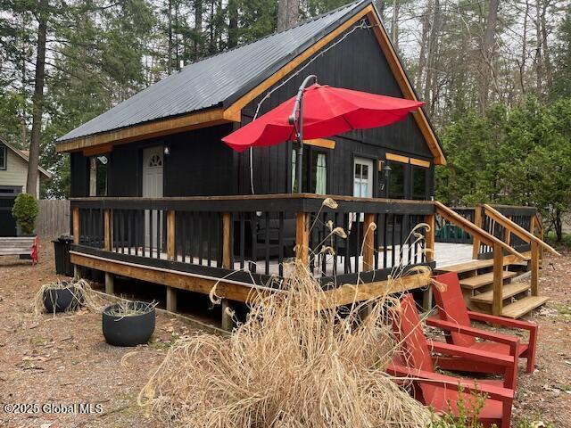15-17 Pine Rd, Lake Luzerne, NY 12846 - exterior space with a deck and metal roof