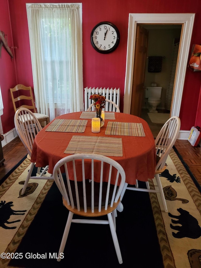 dining space with baseboards