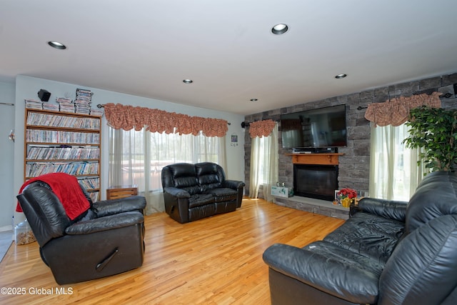 37 Old Hickory Rd, Brunswick, NY 12180 - living area with a stone fireplace, recessed lighting, and wood finished floors