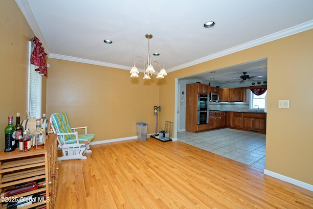 37 Old Hickory Rd, Brunswick, NY 12180 - unfurnished dining area featuring crown molding, baseboards, light wood-type flooring, and recessed lighting