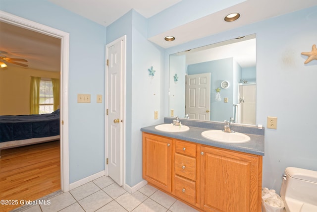 37 Old Hickory Rd, Brunswick, NY 12180 - bathroom with a sink, toilet, ensuite bathroom, and tile patterned floors