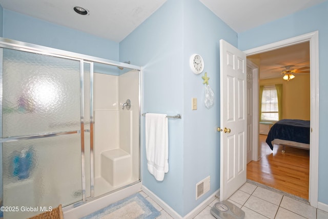 37 Old Hickory Rd, Brunswick, NY 12180 - ensuite bathroom featuring tile patterned floors, visible vents, baseboards, and a shower stall