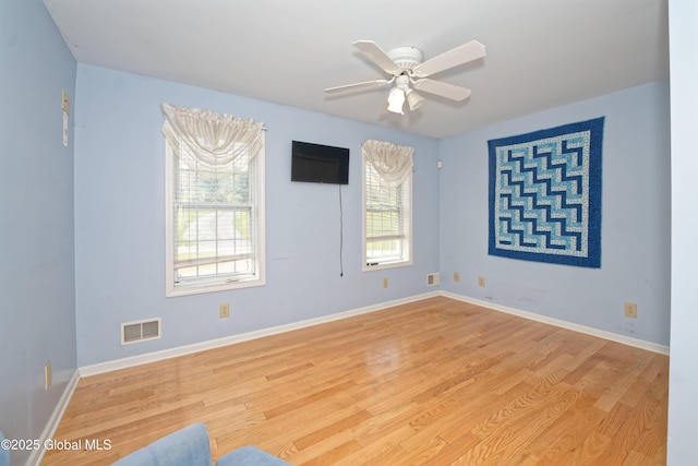 37 Old Hickory Rd, Brunswick, NY 12180 - unfurnished room featuring ceiling fan, a wealth of natural light, visible vents, and wood finished floors