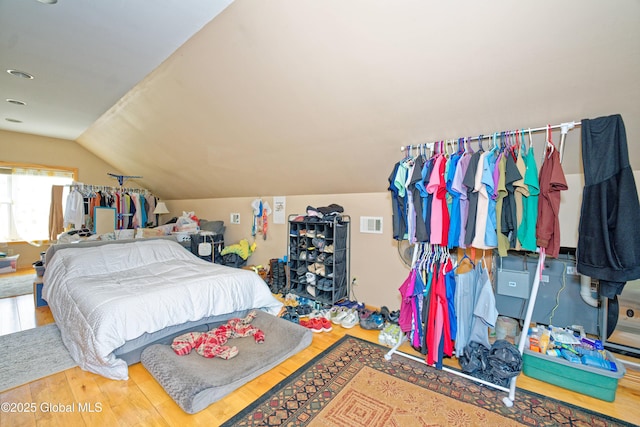 37 Old Hickory Rd, Brunswick, NY 12180 - bedroom with lofted ceiling, visible vents, and wood finished floors