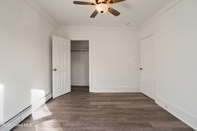 unfurnished bedroom with ceiling fan, dark wood-style flooring, crown molding, baseboards, and a closet