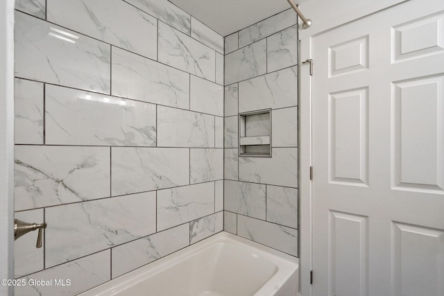 bathroom with shower / bathtub combination
