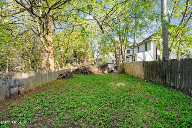 view of yard featuring a fenced backyard