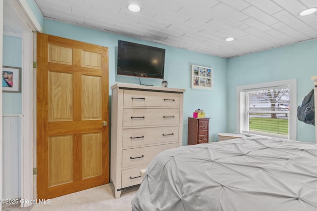 bedroom featuring recessed lighting